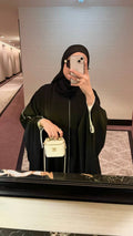 أسود